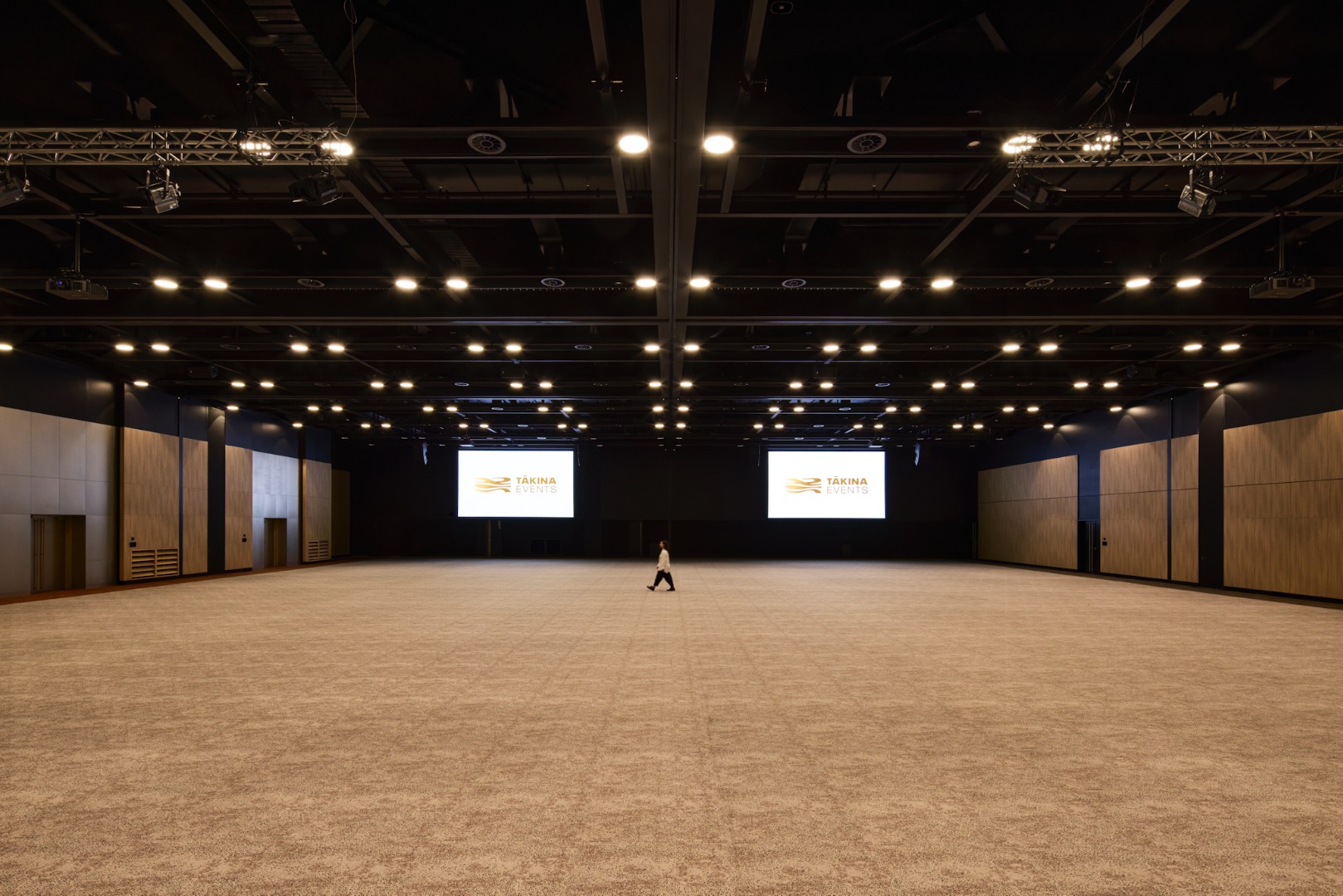 For convention centres, the focus is on reducing environmental impact while creating functional spaces for large gatherings.